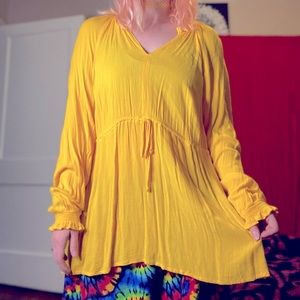 Bright yellow torrid flowy top